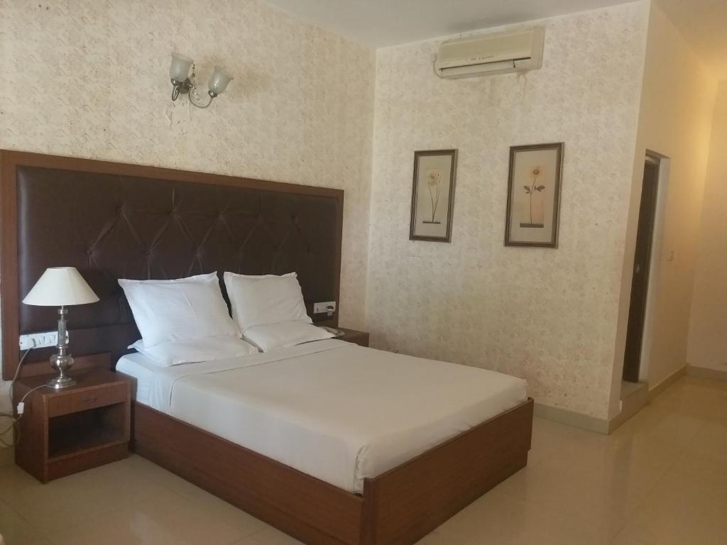 Двухместный (Стандартный двухместный номер с 1 кроватью или 2 отдельными кроватями) отеля Jayamahal Palace Hotel, Бангалор