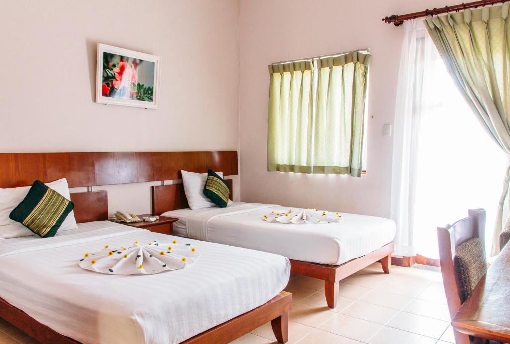 Двухместный (Улучшенный двухместный номер с 1 кроватью или 2 отдельными кроватями и видом на сад) курортного отеля Lazi Beach Resort, Лаги