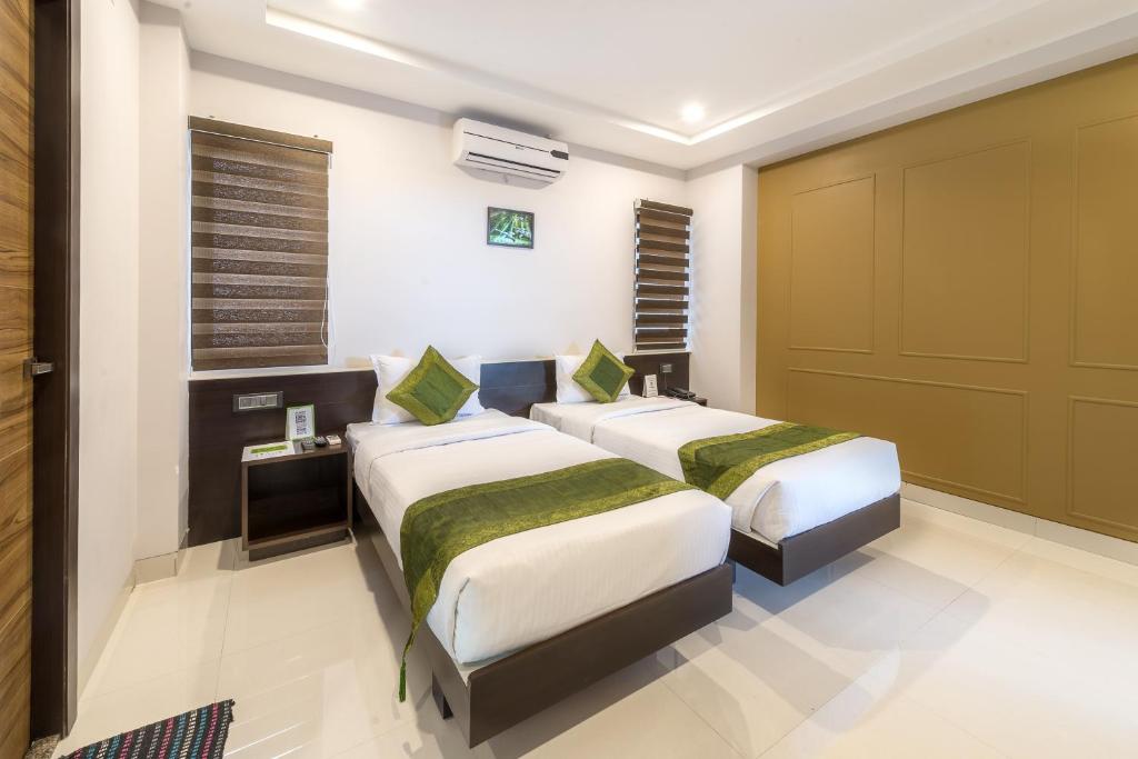 Двухместный ([Sanitized] Standard Double or Twin Room) отеля Treebo Raj Premier, Бангалор