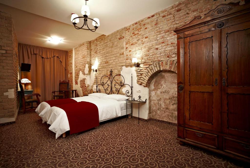 Двухместный (Улучшенный двухместный номер с 1 кроватью или 2 отдельными кроватями) отеля Hotel Justus, Рига