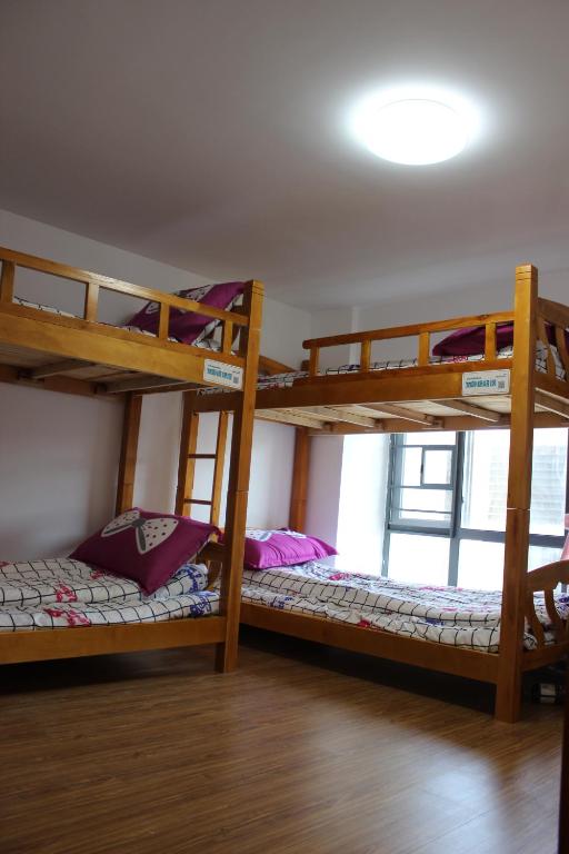 Номер (Кровать в общем номере для женщин с 4 кроватями), Muliang Youth Inn Changlong North Branch