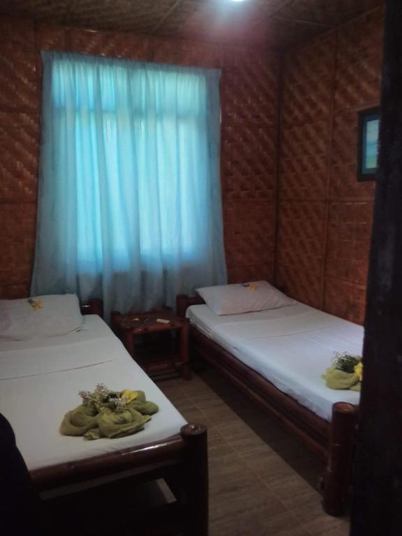 Двухместный (Стандартный двухместный номер с 1 кроватью) отеля CasaKeja Inn, Панглао