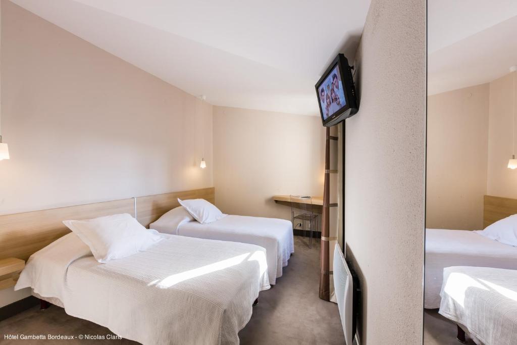 Двухместный (Двухместный номер с 2 отдельными кроватями и видом во внутренний двор) отеля Hôtel Gambetta, Бордо