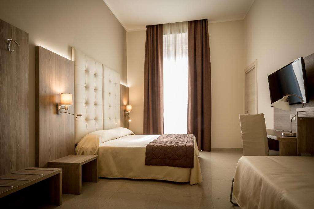 Двухместный (Улучшенный двухместный номер с 1 кроватью или 2 отдельными кроватями) отеля Hotel Bel Soggiorno, Генуя