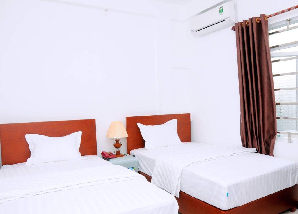 Двухместный (Двухместный номер с 2 отдельными кроватями) отеля Sunflower Hotel, Ниньбинь
