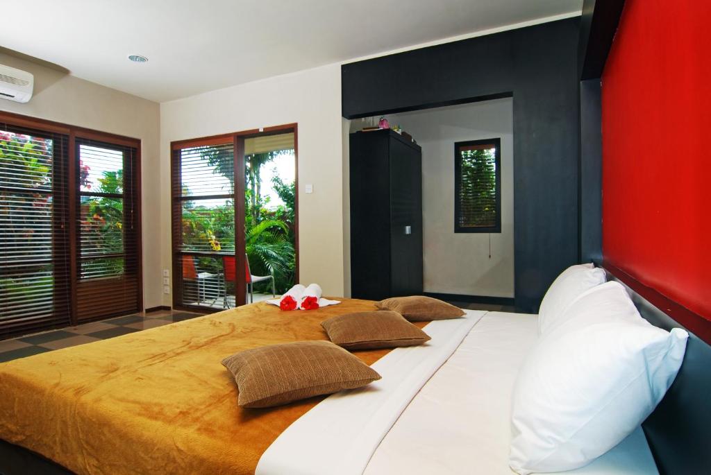 Апартаменты (Улучшенные апартаменты с 1 спальней) апарт-отеля Taman Ayu Town House, Денпасар