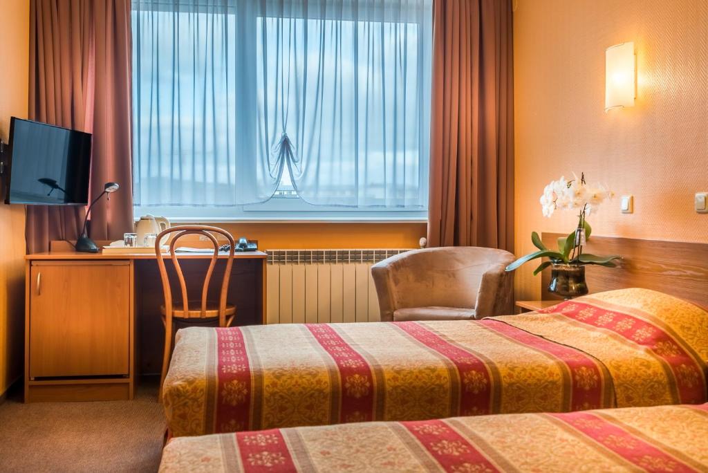 Двухместный (Двухместный номер с 2 отдельными кроватями), Hotel Zemaites