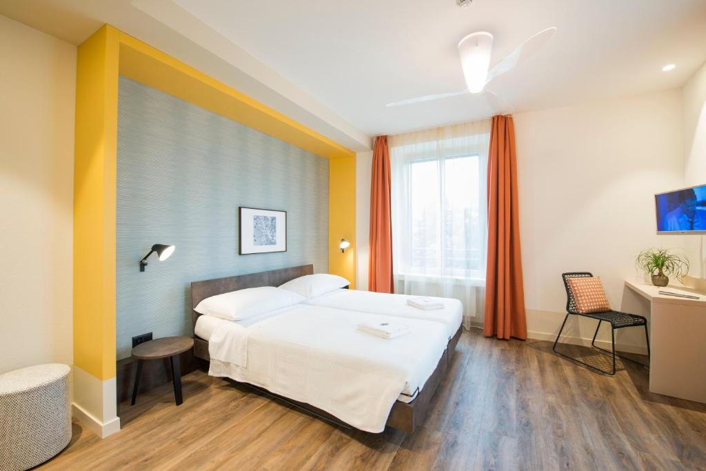 Двухместный (Двухместный номер «Комфорт» с 1 кроватью или 2 отдельными кроватями) отеля Hotel Pestalozzi Lugano, Лугано