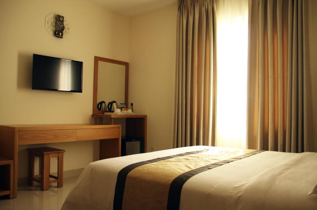 Двухместный (Улучшенный двухместный номер с 1 кроватью) отеля Gia Vien Hotel, Хошимин