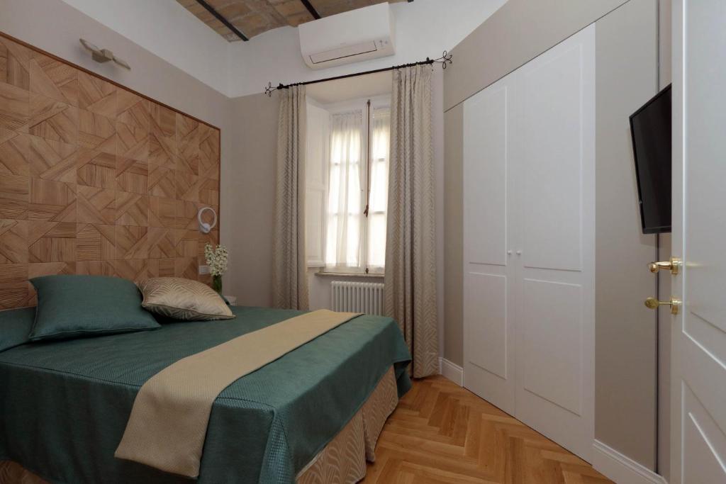 Апартаменты (Two-Bedroom Apartment (4 Adults) - V. San Giovanni in Laterano 250), Bellezza Al Colosseo