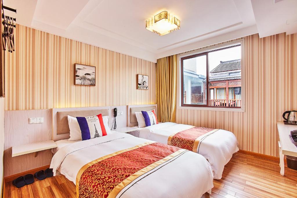 Двухместный (Двухместный номер с 2 двуспальными кроватями) хостела Hangzhou Xihu Qinghe Hostel, Ханчжоу