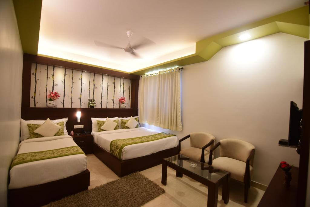 Трехместный (Трехместный номер) отеля Hotel Varanasi Inn, Варанаси