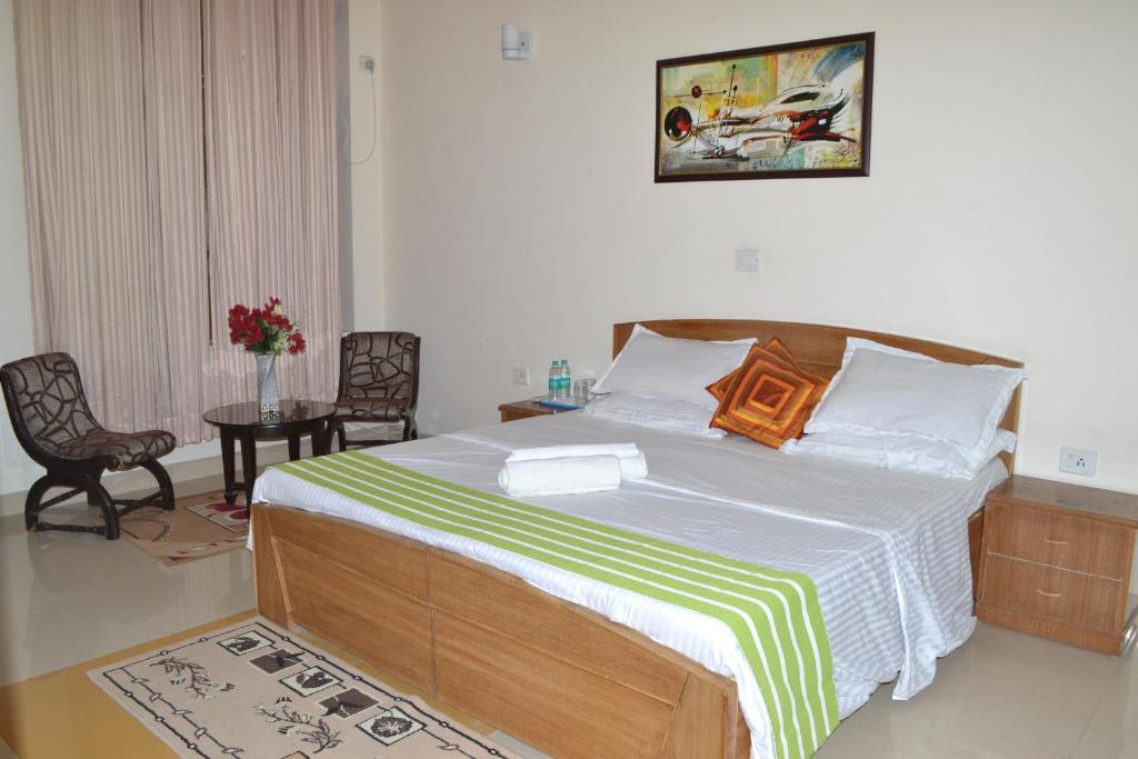 Двухместный (Двухместный номер Делюкс с 1 кроватью или 2 отдельными кроватями) отеля Raj Cottage Ganga Vatika, Ришикеш