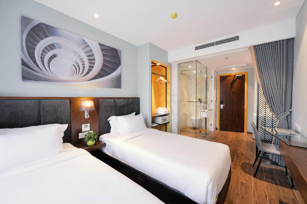 Двухместный (Двухместный номер Делюкс с 2 отдельными кроватями и видом на город) отеля Grand Cititel Hanoi Hotel, Ханой