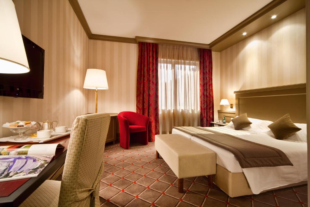 Двухместный (Двухместный номер с 1 кроватью или 2 отдельными кроватями) отеля Hotel De La Paix, Лугано