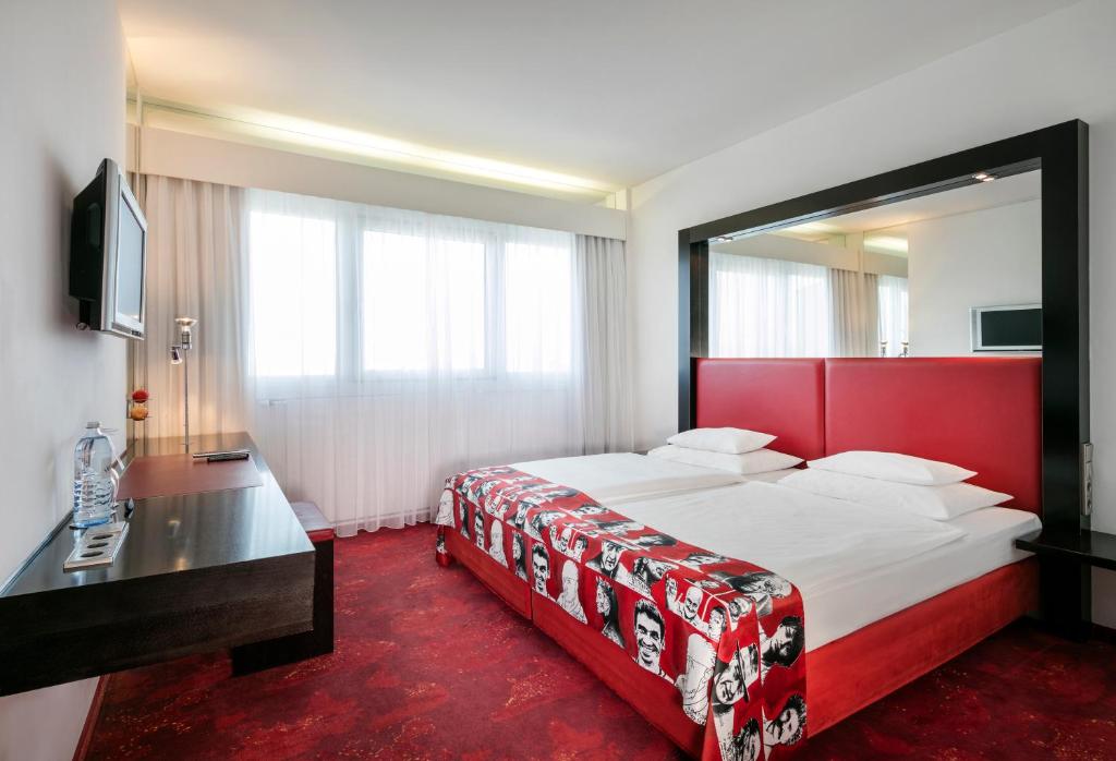 Двухместный (Улучшенный двухместный номер с 1 кроватью) отеля ARCOTEL Nike, Линц