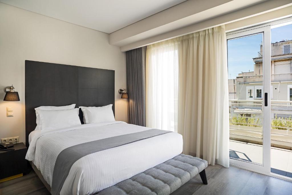 Двухместный (Двухместный номер Делюкс с 1 кроватью и балконом) отеля Hotel Lozenge, Афины