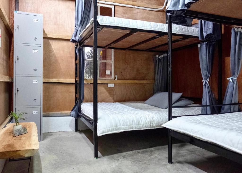 Номер (Спальное место на двухъярусной кровати в общем номере для мужчин и женщин) отеля Jasmine Hostel, Хазянг