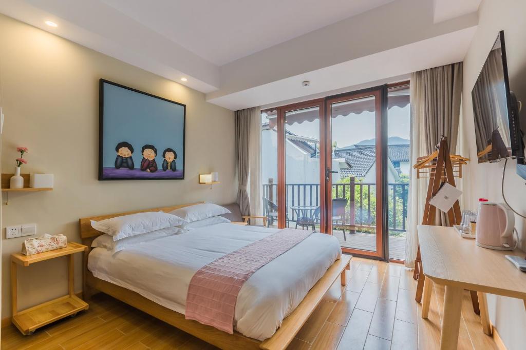 Двухместный (Двухместный номер с 1 кроватью и балконом), Hangzhou Pupu Homestay