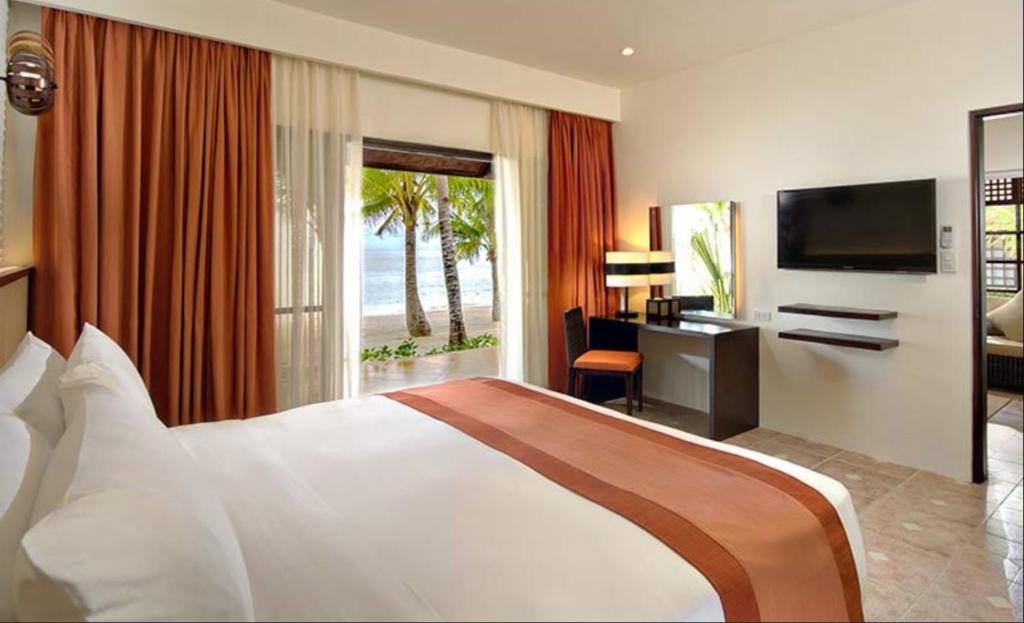 Двухместный (Двухместный номер «Премьер» с 1 кроватью или 2 отдельными кроватями, вид на пляж) курортного отеля South Palms Resort Panglao, Панглао