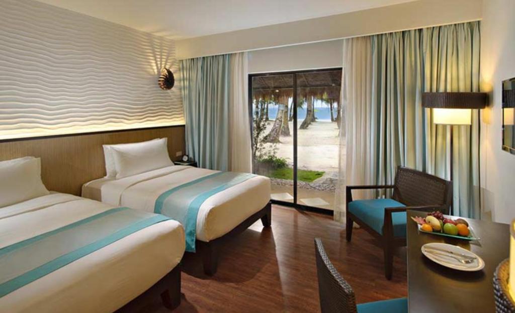 Двухместный (Двухместный номер Делюкс с 1 кроватью или 2 отдельными кроватями, вид на пляж) курортного отеля South Palms Resort Panglao, Панглао