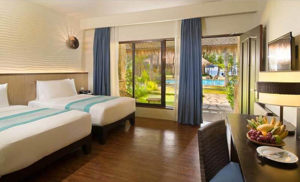 Двухместный (Двухместный номер Делюкс с 1 кроватью или 2 отдельными кроватями и видом на бассейн) курортного отеля South Palms Resort Panglao, Панглао