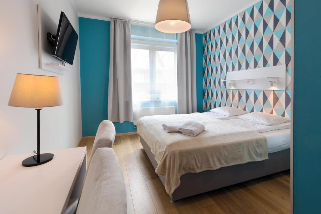 Двухместный (Стандартный двухместный номер с 1 кроватью и собственной ванной комнатой) хостела Premium Hostel, Краков
