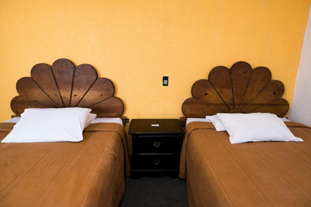 Двухместный (Двухместный номер с 2 двуспальными кроватями) отеля Hotel María Elena, Дуранго