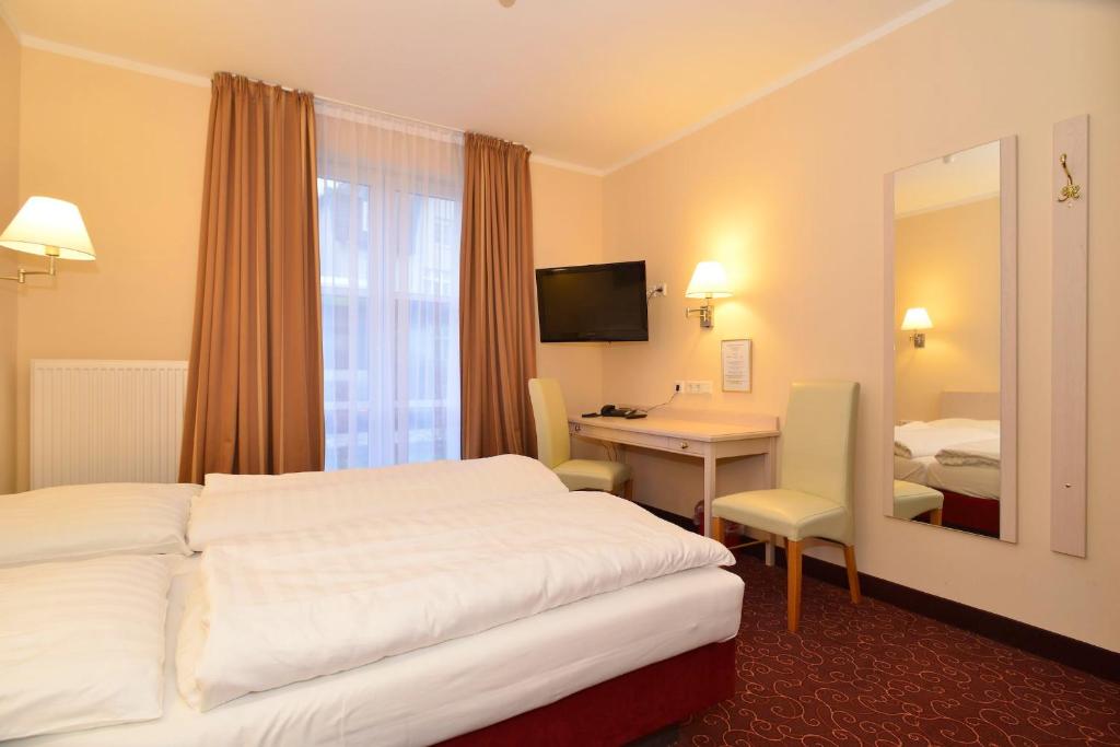 Двухместный (Двухместный номер с 1 кроватью или 2 отдельными кроватями) отеля Hotel Behrmann, Гамбург