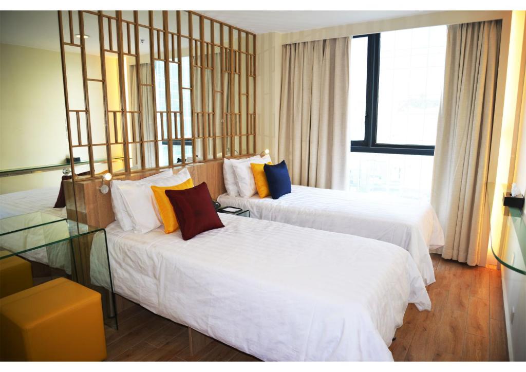 Двухместный (Стандартный двухместный номер с 2 отдельными кроватями) отеля IW Hotel, Гонконг (город)