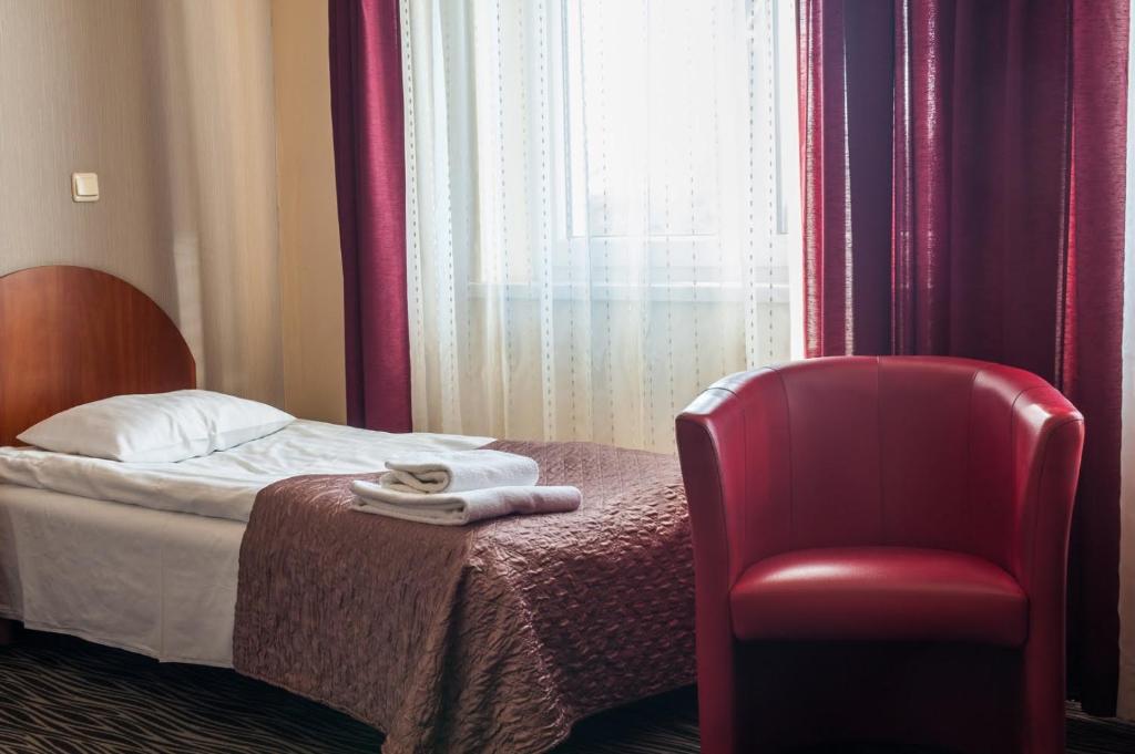 Трехместный (Трехместный номер с ванной комнатой) отеля Hotel Horyzont, Жешув
