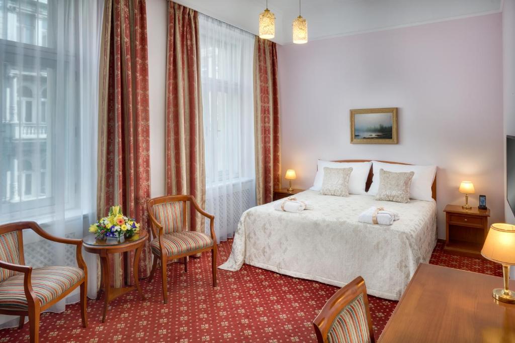 Двухместный (Улучшенный двухместный номер с 1 кроватью или 2 отдельными кроватями) отеля Boutique Hotel Seven Days, Прага