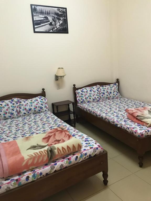 Двухместный (Двухместный номер с 2 отдельными кроватями и собственной ванной комнатой) гостевого дома My Anh Guest House, Далат