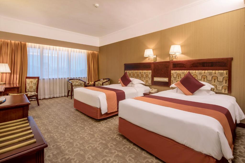 Двухместный (Двухместный номер Делюкс с 2 отдельными кроватями) отеля Asia International Hotel Guangdong, Гуанчжоу
