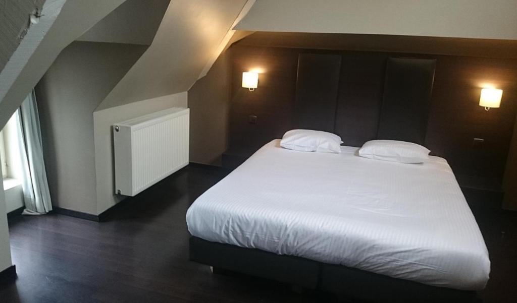 Двухместный (Улучшенный двухместный номер с 2 отдельными кроватями) отеля Hotel 't Putje, Брюгге
