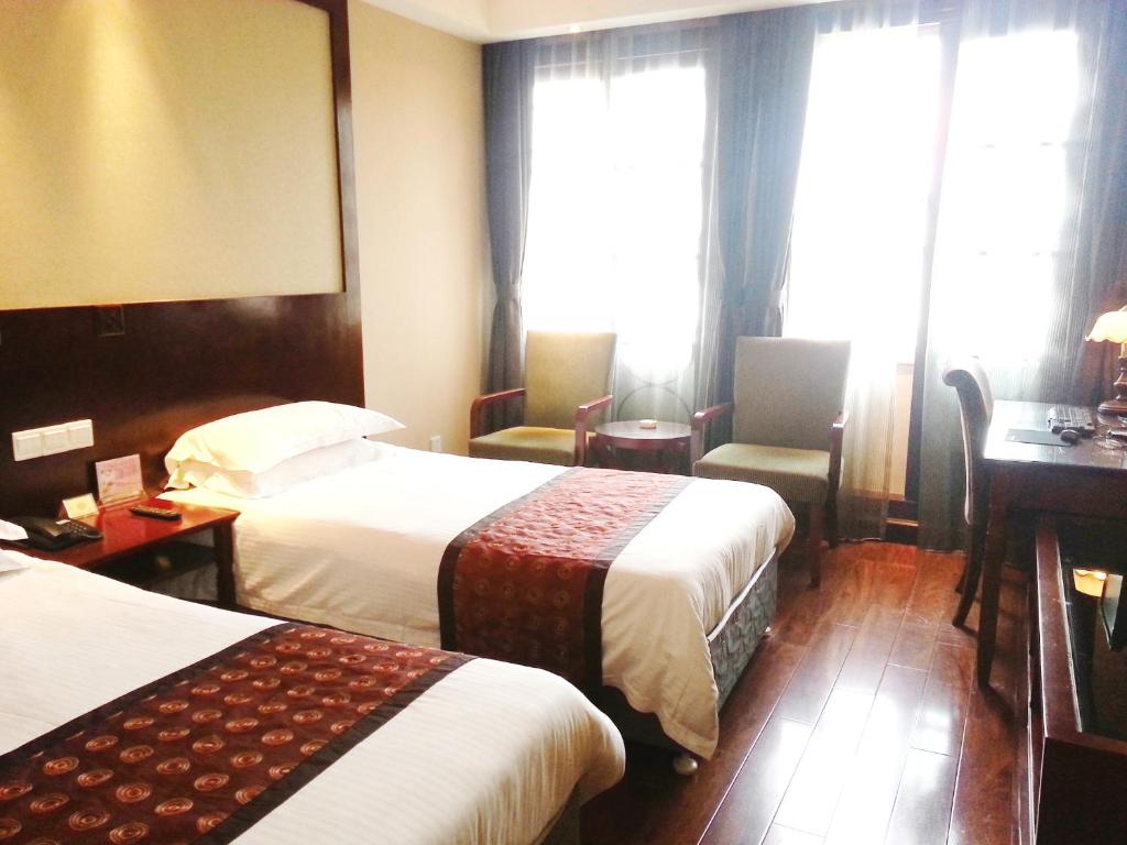 Двухместный (Двухместный номер Делюкс с 1 кроватью или 2 отдельными кроватями) отеля Seventh Heaven Hotel, Шанхай