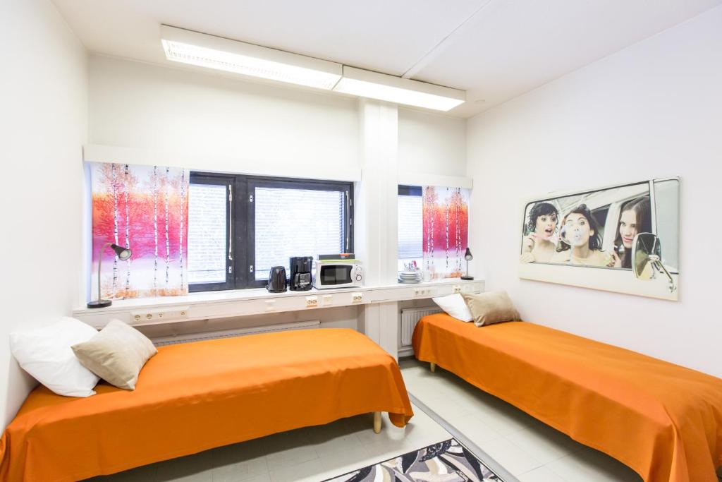 Двухместный (Двухместный номер с 2 отдельными кроватями и общей ванной комнатой) хостела Forenom Hostel Vantaa Airport, Вантаа