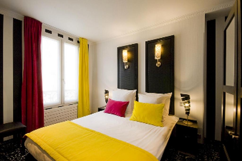 Двухместный (Классический двухместный номер с 1 кроватью или 2 отдельными кроватями) отеля Hotel Peyris Opera, Париж