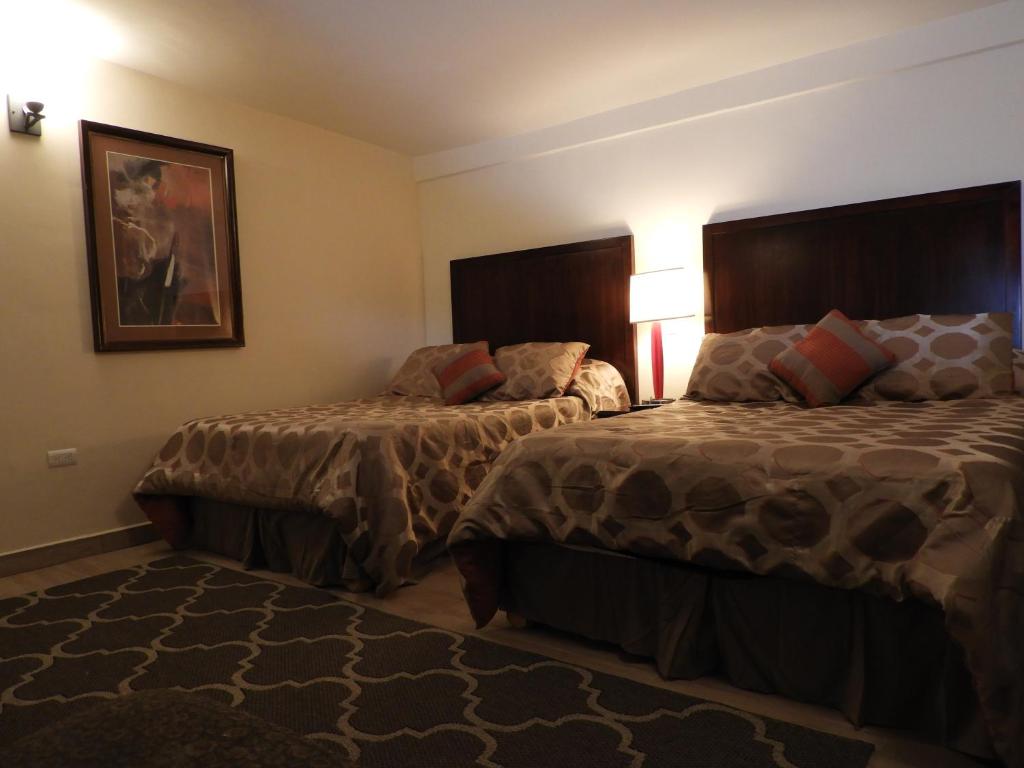 Двухместный (Номер Делюкс с 2 кроватями размера «queen-size») апарт-отеля Casona San Cayetano Suites & Lofts, Гуанахуато