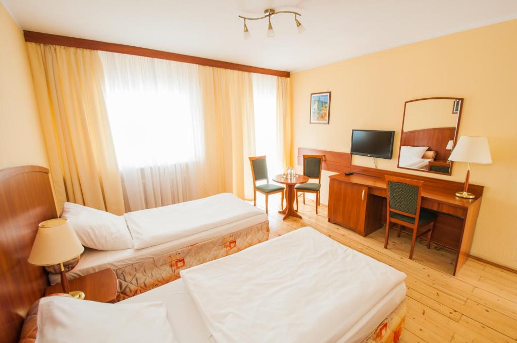 Двухместный (Стандартный двухместный номер с 2 отдельными кроватями) отеля Hotel Camping Malta, Познань
