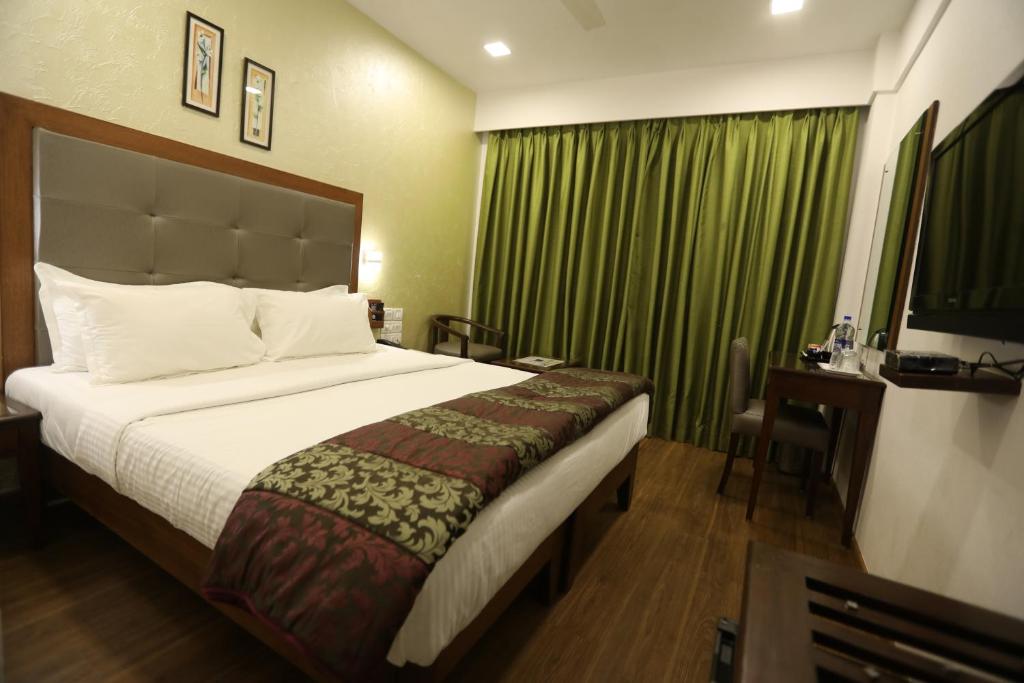 Двухместный (Представительский двухместный номер с 1 кроватью или 2 отдельными кроватями) отеля Citizen Hotel, Мумбай
