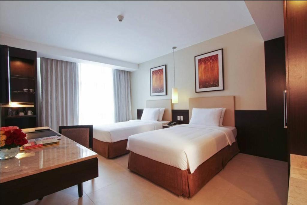 Двухместный (Стандартный двухместный номер с 1 кроватью или 2 отдельными кроватями) отеля The B Hotel - Managed by The Bellevue Group of Hotels Inc, Манила