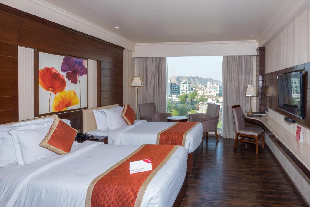 Трехместный (Трехместный номер Делюкс) отеля Shakun Hotels And Resorts, Джайпур