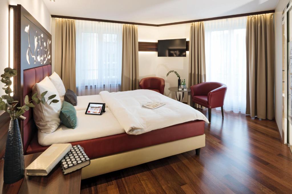Двухместный (Улучшенный двухместный номер с 1 кроватью или 2 отдельными кроватями) отеля Scheuble Hotel, Цюрих