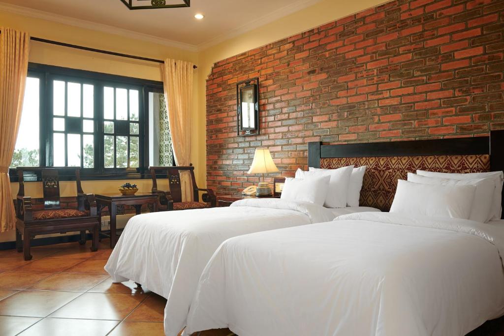 Двухместный (Двухместный номер Pine Hill с 1 кроватью или 2 отдельными кроватями) курортного отеля La Paz Resort Tuan Chau Ha Long, Халонг