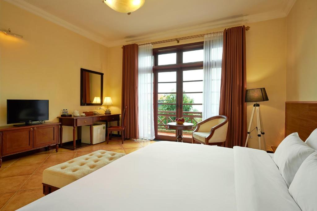 Двухместный (Двухместный номер «Делюкс-променад» с 1 кроватью или 2 отдельными кроватями) курортного отеля La Paz Resort Tuan Chau Ha Long, Халонг