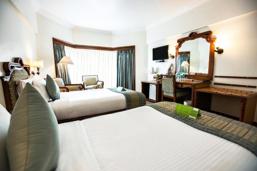 Двухместный (Представительский двухместный номер с 1 кроватью или 2 отдельными кроватями — В номере нельзя курить) отеля Hotel Sea Princess, Мумбай