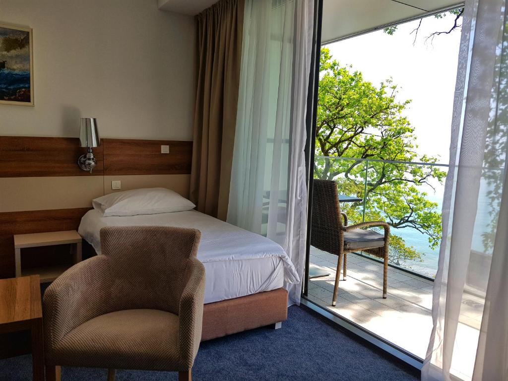 Двухместный (Двухместный номер Делюкс с 1 кроватью или 2 отдельными кроватями и видом на море) отеля Boutique Hotel Mali Raj, Опатия
