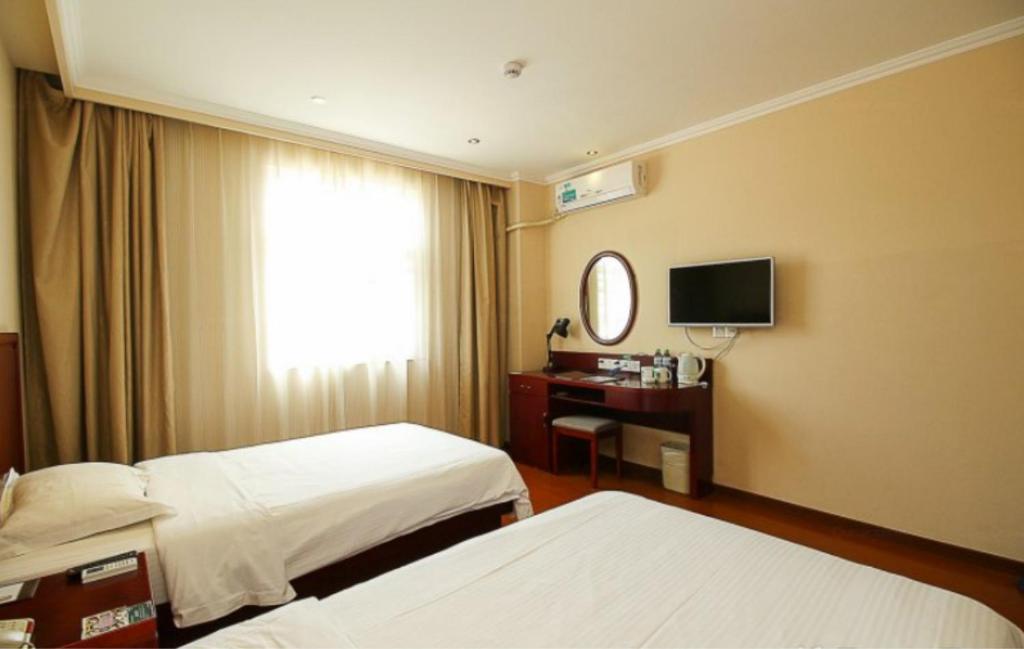 Двухместный (Стандартный двухместный номер с 2 отдельными кроватями) отеля GreenTree Inn Hainan Haikou Guomao Business Hotel, Хайкоу