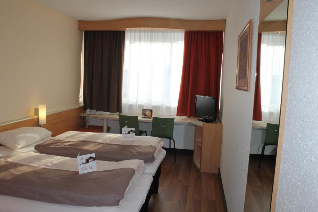 Двухместный (Стандартный двухместный номер с 2 отдельными кроватями) отеля Ibis Linz City, Линц